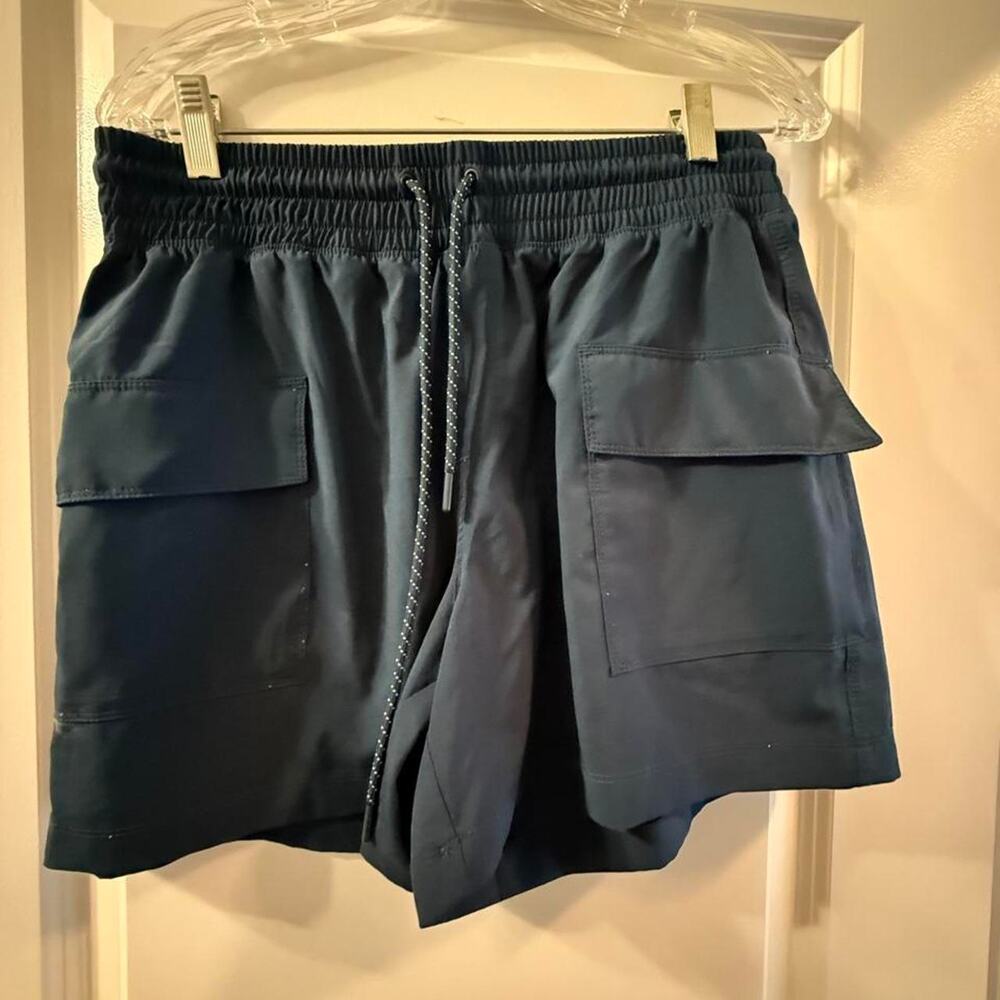 Navy blue athletic shorts with size M